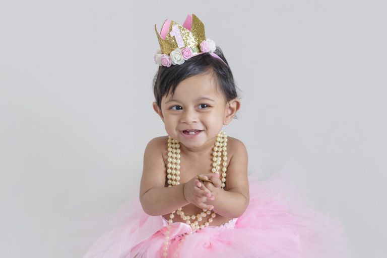 First Birthday party girl photoshoot with party crown and tutu