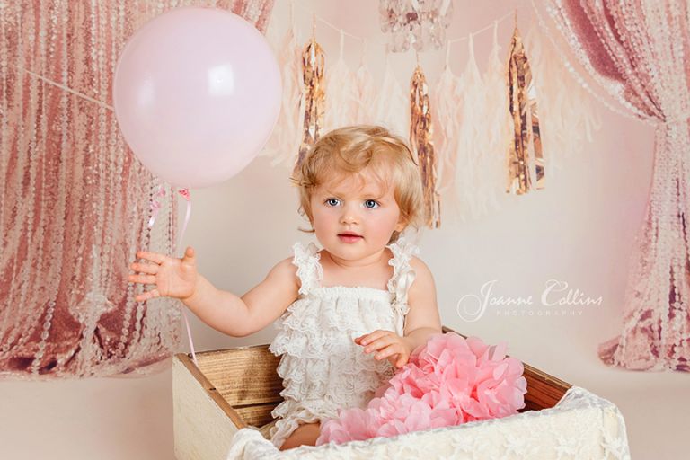 first year birthday shoot, 1 year old girl in lace romper