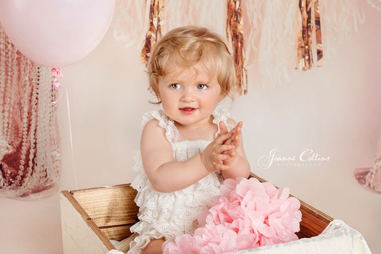 first year birthday shoot, 1 year old girl in lace romper