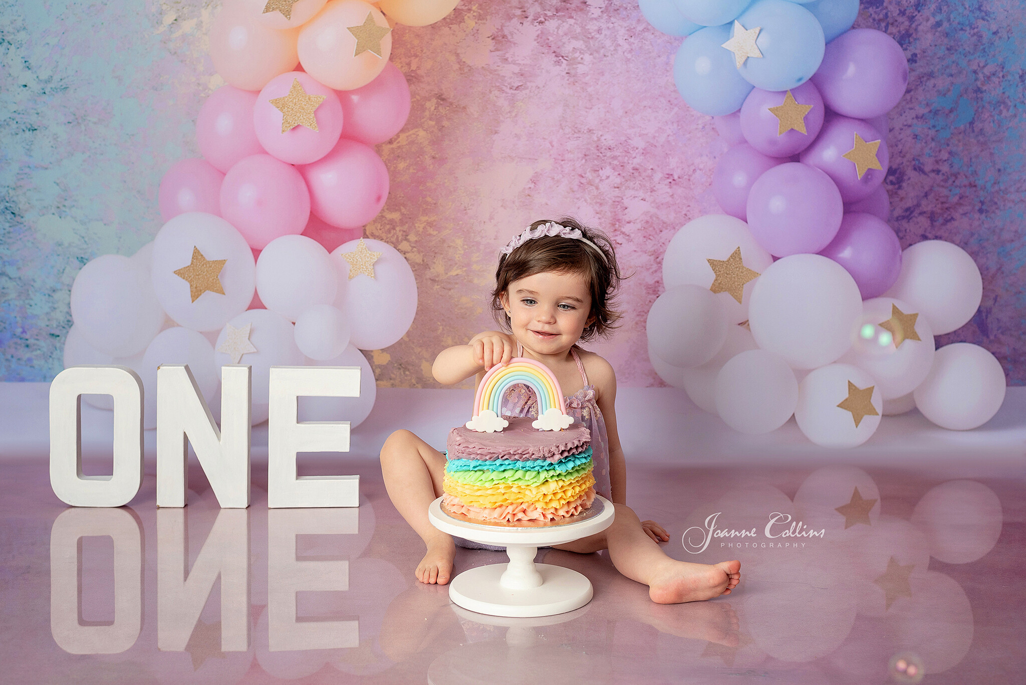cake smash photographer sittingbourne kent girls first birthday photoshoot