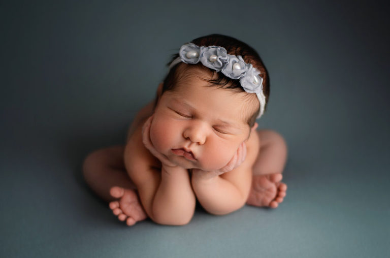 Newborn Photography Training and baby safety. Newborn baby girl in the froggy pose